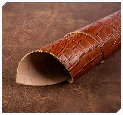 Close-up of crocodile embossed leather - hand cut and hand made